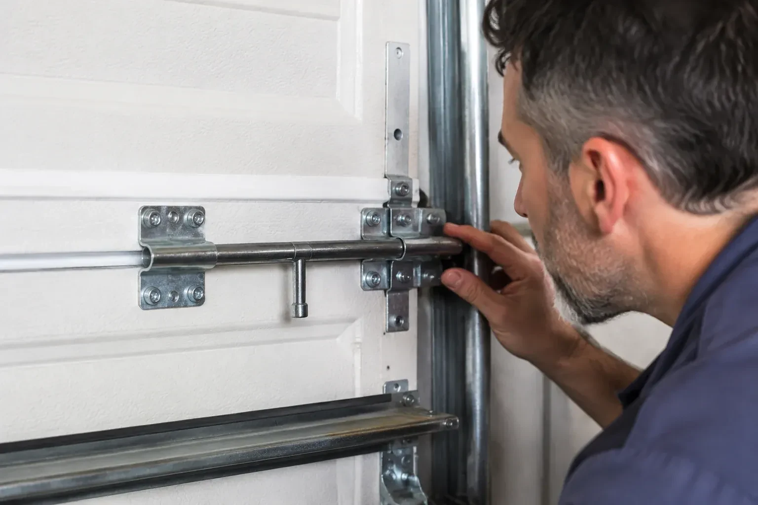 Illustrative garage doors scene; not an actual job — Garage Door Manual Lock Repair, Essa
